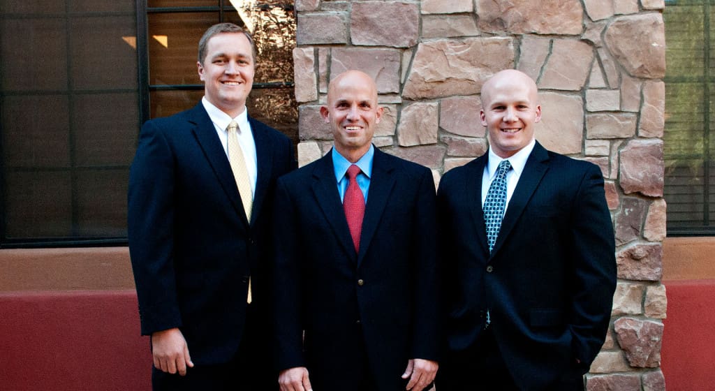 three smiling people, estate planning