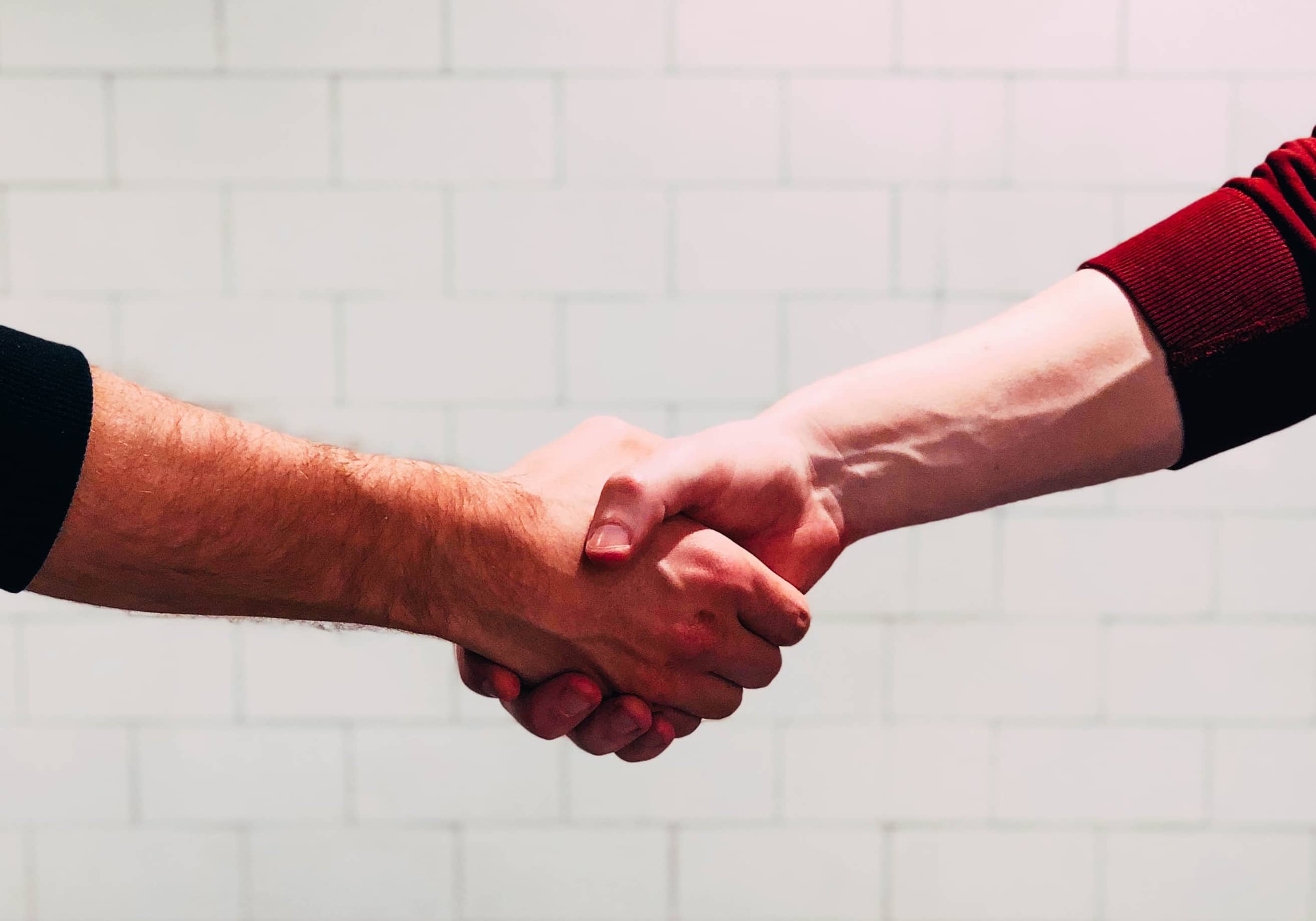 long-term care plan - two hands shaking