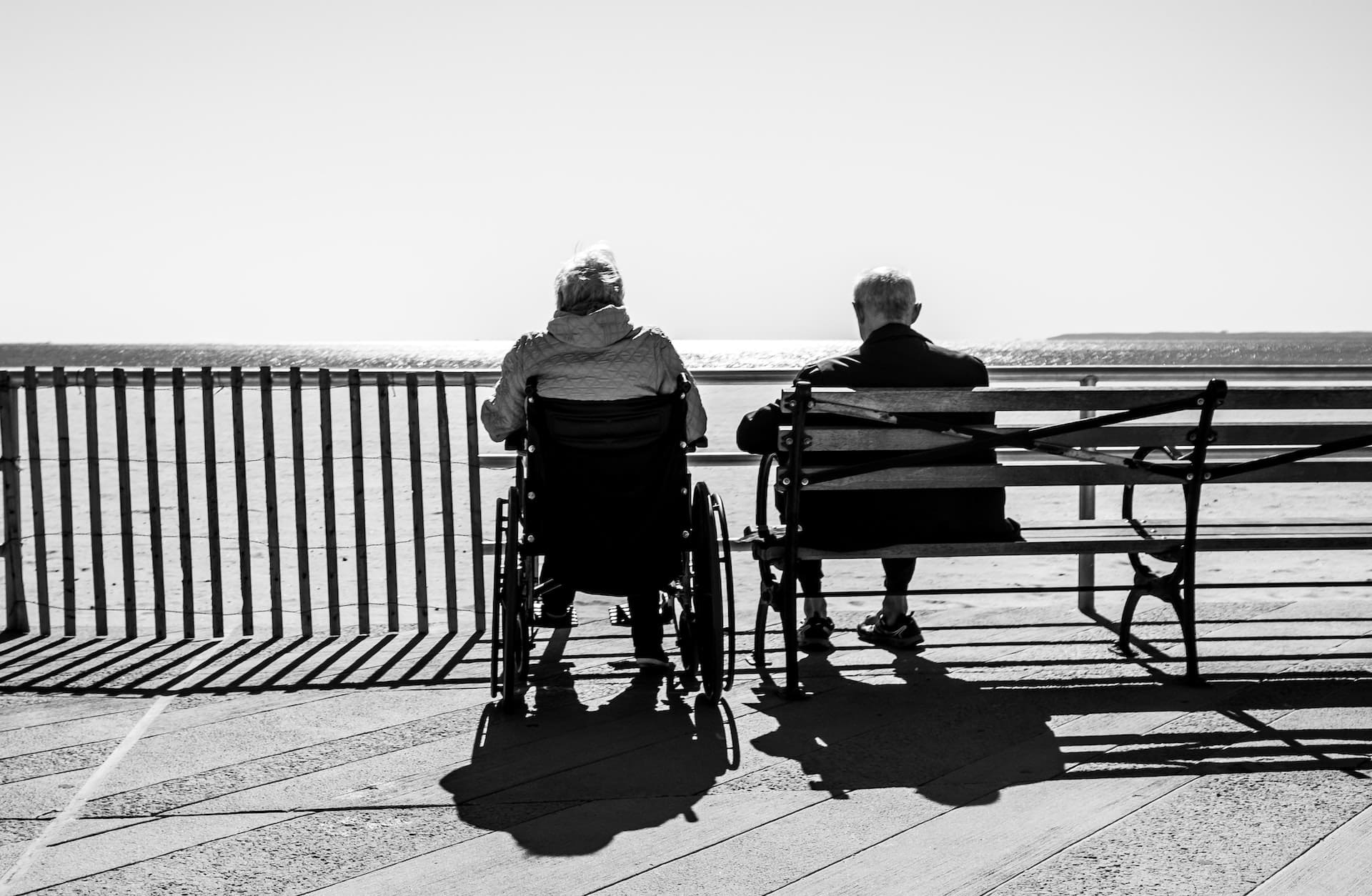 how to change power of attorney - person in wheelchair sitting next to person on bench