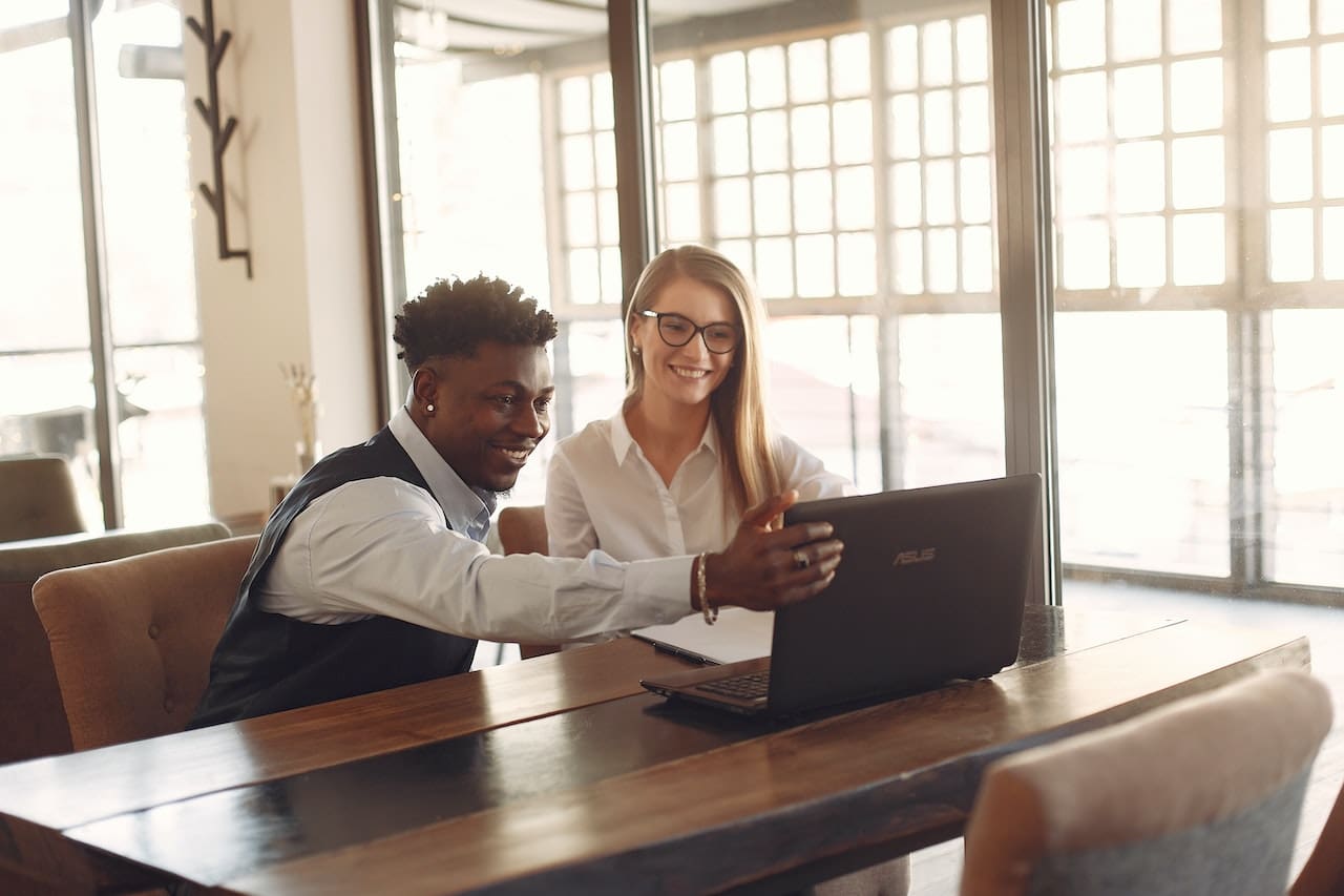 what is a pour-over will - man and woman looking at computer screen